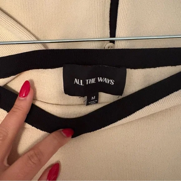 Chic Cream Top and Mini Skirt with Black Accents - Picture 9 of 10